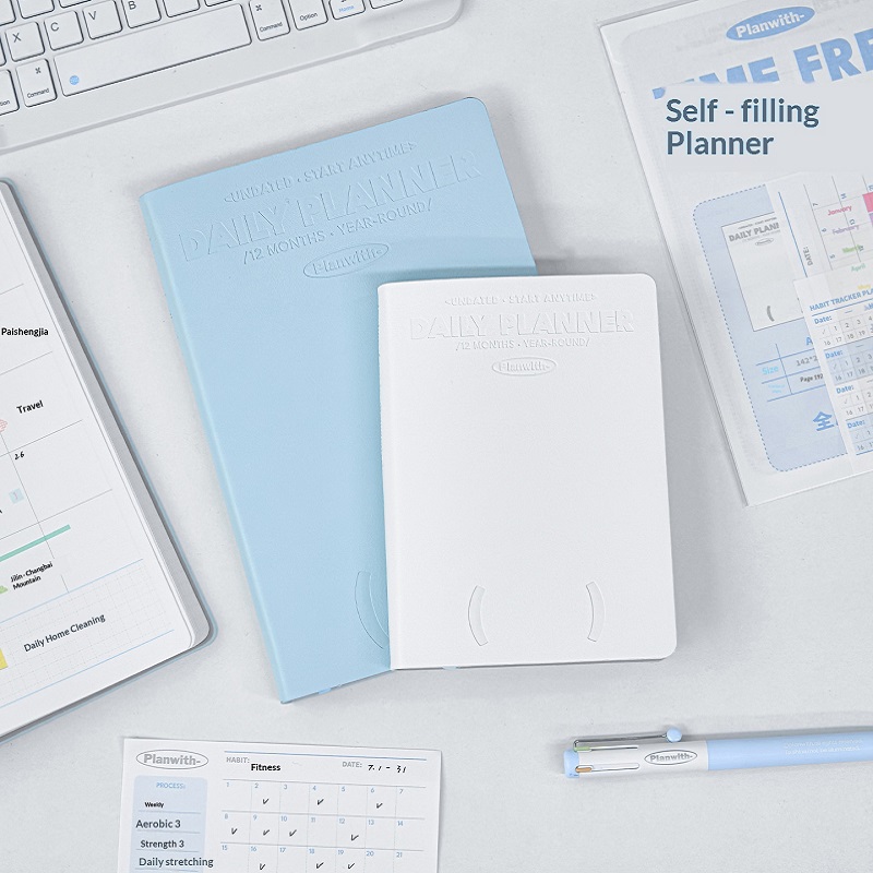 Plan met zelfgeplaatste jaarpl - Leather Work Diary recensie en prijs